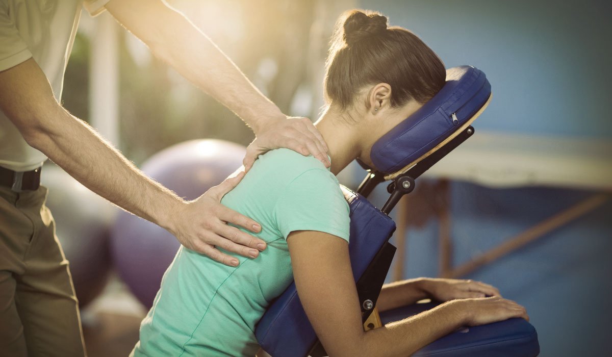 Motorized Flexion Distraction Therapy being administered by chiropractor